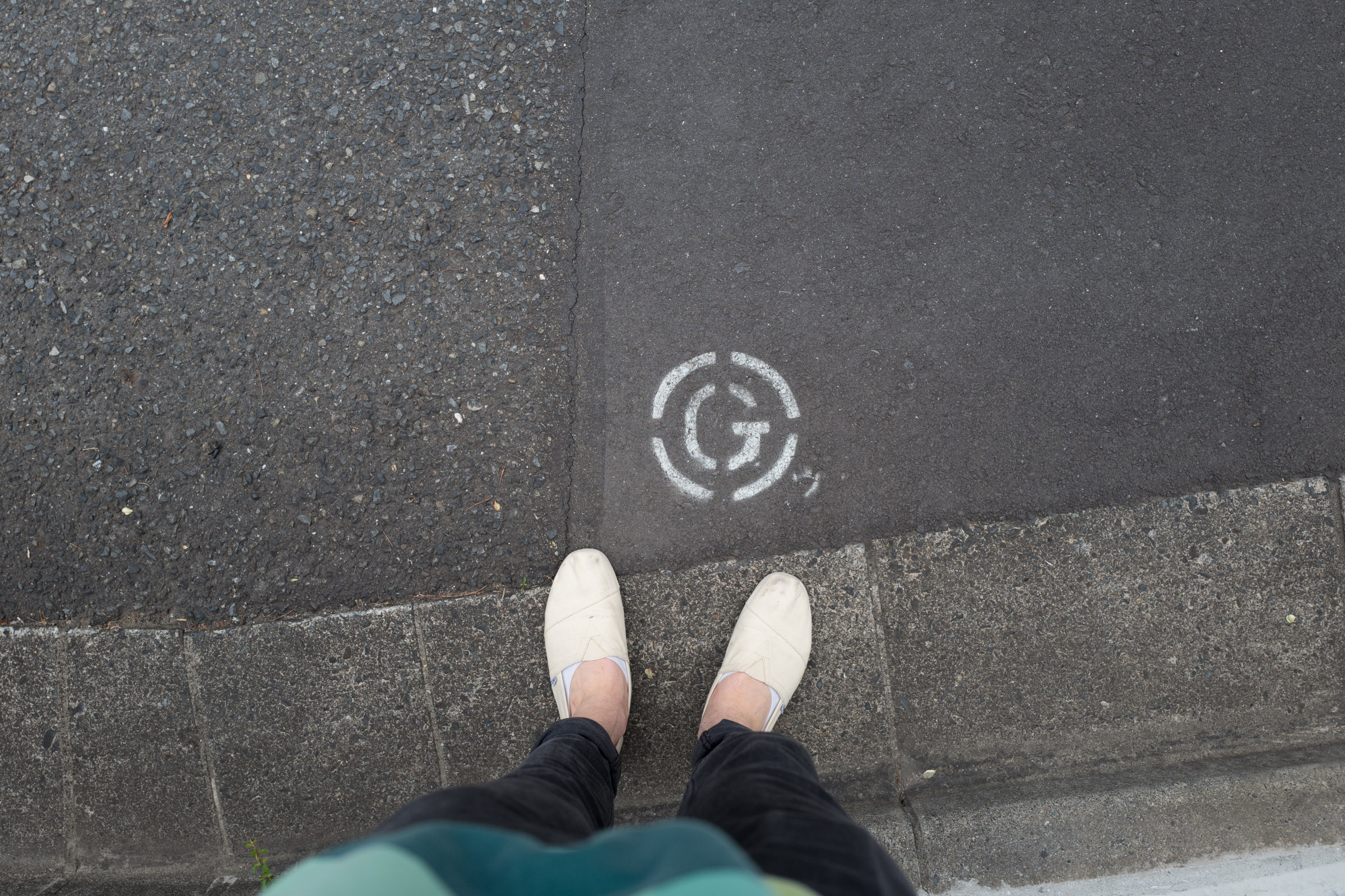 A “G” stenciled onto the streets of Tokyo